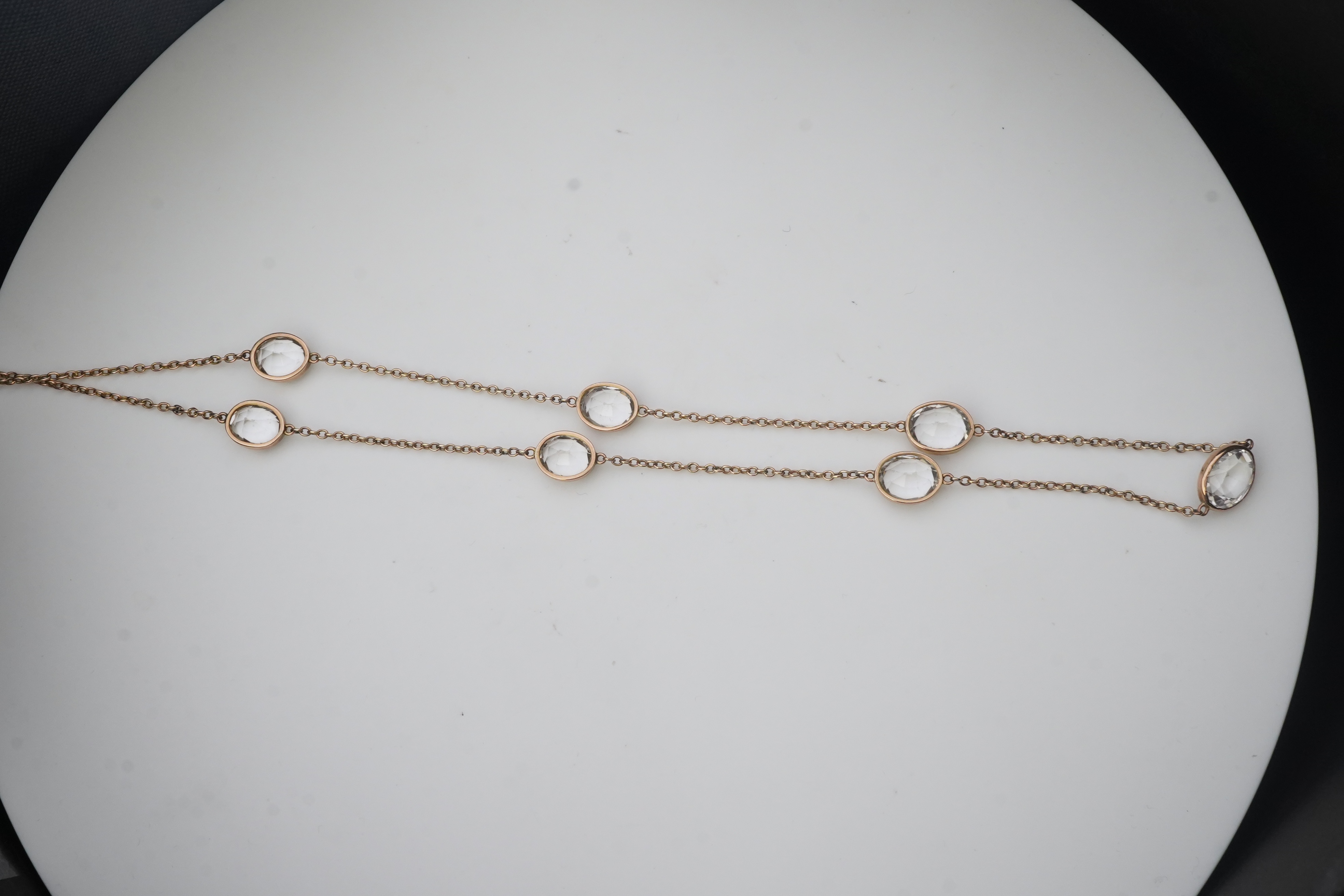 A rock crystal long chain necklace, early 20th century